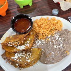 Michelle’s Tacos - Birria tacos, rice and beans.