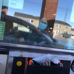 Hy-Vee Drugstore #5 - Melanie handing me my prescription