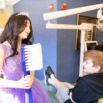 myKIDSdds - Twinkle the Tooth Fairy talking to a patient at myKIDSdds. - Pediatric Dentists Near Me - Dallas, Texas