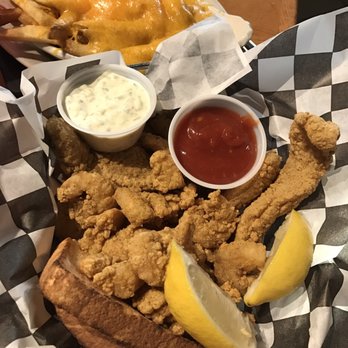 Southside Cafe - Seafood basket. My husband always get this and he can eat a lot. He rings home food every time. He added the cheese to his fries. - American Near Me - Slidell, Louisiana
