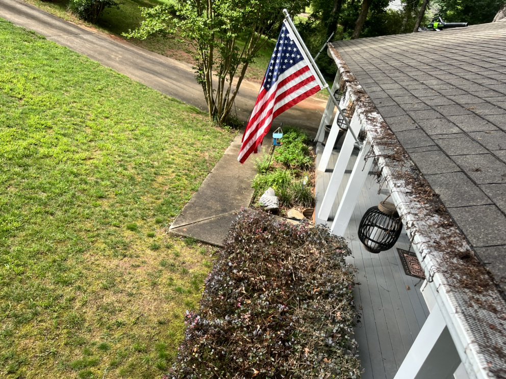 Slide of Ezzell Gutter And Roof Cleaning