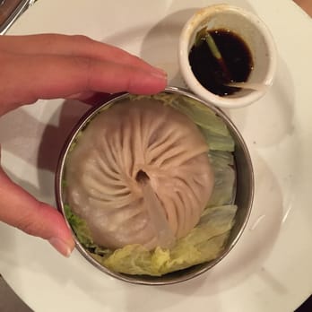 Peter Chang - Peter's Big Bun (aka giant xiao long bao). There's a delicious pork soup inside. The dumpling's skin is okay, though. - Szechuan Near Me - Arlington, Virginia Peter Chang - Peter's Big Bun (aka giant xiao long bao). There's a delicious pork soup inside. The dumpling's skin is okay, though. - Szechuan Near Me - Arlington, Virginia
