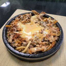 Spicy chicken bulgogi bibimbap with fried egg and yummy sauce