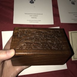 Beautiful carved wooden box. Cards with his paw print and a certificate. Truly grateful for the compassion they showed. Beautiful carved wooden box. Cards with his paw print and a certificate. Truly grateful for the compassion they showed.