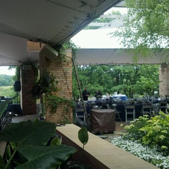 Chicago Botanic Garden - A shot of one area for private events. It sits on a lake with beautiful footbridges in the background. - Botanical Gardens Near Me - Glencoe, Illinois