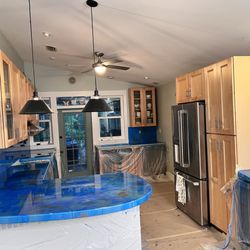 One of a Kind Epoxy Designs - Freshly poured new Epoxy countertops and backsplash over my old black cement counters