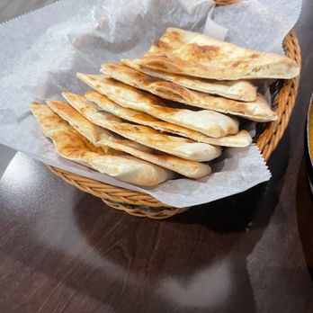 Zaiqa BBQ & Karahi - a basket of flatbreads and a bowl of soup - Pakistani Near Me - Germantown, Maryland