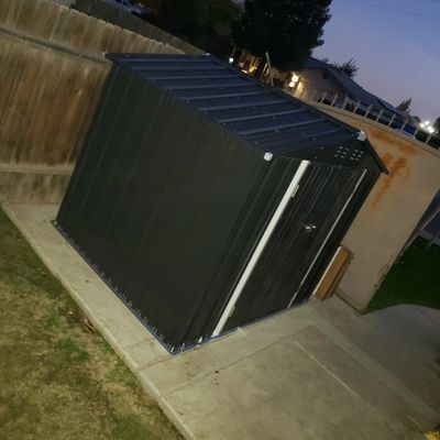 Back Yard Shed Installation - This customer needed some more secured space in her backyard. A 6' by 8' shed for extra spacing was secured to the concrete & installed for them. Back Yard Shed Installation - This customer needed some more secured space in her backyard. A 6' by 8' shed for extra spacing was secured to the concrete & installed for them.