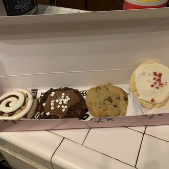 Crumbl - Mesa Grand - Crumbl cookies cinnamon roll, hot chocolate, chocolate chip and chilled peppermint - Bakeries Near Me - Mesa, Arizona