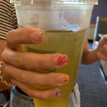 Green Ivy Nails & Spa - My daughters nails with really flowers. Some places want to charge 10 per nail for this. We paid 58.00 here for all ten nails. - Nail Salons Near Me - Temecula, California