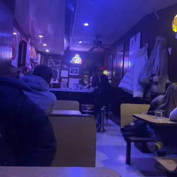 Scarr's Pizza - Small dining area with 4 booths and bar seating - Pizza Near Me - New York, New York Scarr's Pizza - Small dining area with 4 booths and bar seating - Pizza Near Me - New York, New York