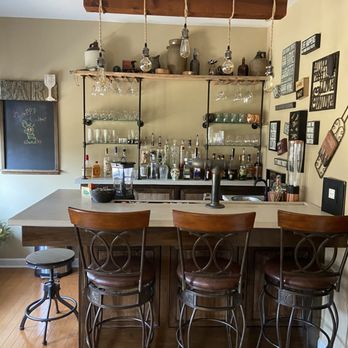 Timmons Carpentry - Custom Bar with Custom Cedar Beam Light Fixture - Cabinetry Near Me - Clover, South Carolina Timmons Carpentry - Custom Bar with Custom Cedar Beam Light Fixture - Cabinetry Near Me - Clover, South Carolina