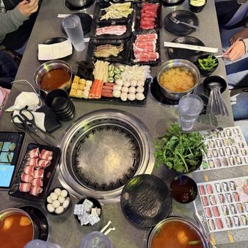 Hungry Pot Korean BBQ & Hot Pot - Our spread - we got both bbq and hot pot - Korean Near Me - Natick, Massachusetts Hungry Pot Korean BBQ & Hot Pot - Our spread - we got both bbq and hot pot - Korean Near Me - Natick, Massachusetts