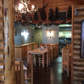 Europa - Peeking into the dining area. Cozy with fire place. - Modern European Near Me - Black Diamond, Washington