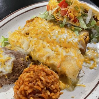 Cocina De Dominguez - Enchilada, taco combo.  Photography magic enhanced rice and beans portion sizes - New Mexican Cuisine Near Me - Gallup, New Mexico