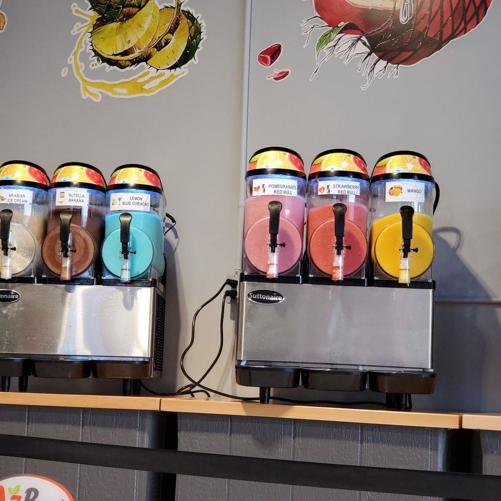 Azberry - a variety of juices on display - Juice Bars & Smoothies Near Me - Mississauga, Ontario