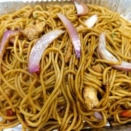 Tallarin Saltado de Pollo - basically chicken lo mein, but with Peruvian spices. HEAPING portion. This was legit a 2 lb. tray. Tallarin Saltado de Pollo - basically chicken lo mein, but with Peruvian spices. HEAPING portion. This was legit a 2 lb. tray.