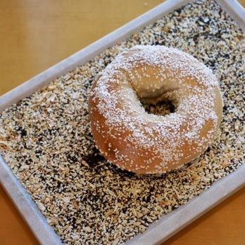 Bagels 'n Grinds - Salt Bagel on bed of everything bagel seasoning - Breakfast & Brunch Near Me - Hanover, Maryland Bagels 'n Grinds - Salt Bagel on bed of everything bagel seasoning - Breakfast & Brunch Near Me - Hanover, Maryland