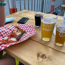 Happy hour special. 2 slices of delicious pizza and a brew for $10!!