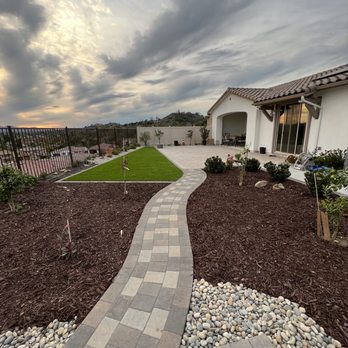 Green Outlook Landscape - a pathway leading to a home - Landscaping Near Me Green Outlook Landscape - a pathway leading to a home - Landscaping Near Me