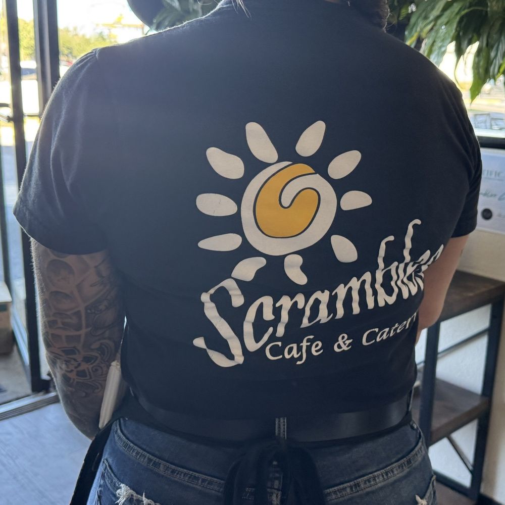 Scrambles Cafe - Our waitress Laura in her Scrambles shirt - Breakfast & Brunch Near Me - Ocala, Florida Scrambles Cafe - Our waitress Laura in her Scrambles shirt - Breakfast & Brunch Near Me - Ocala, Florida