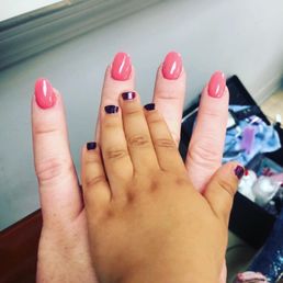 Don't judge the purple: they let me do the purple for my little girl during my pedi. My hands are the pink and the full set is fabulous! Don't judge the purple: they let me do the purple for my little girl during my pedi. My hands are the pink and the full set is fabulous!