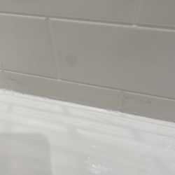 Whitewater Kitchen and Bath - The grey area is holes in the material that has already collected dirt after 2 weeks of use