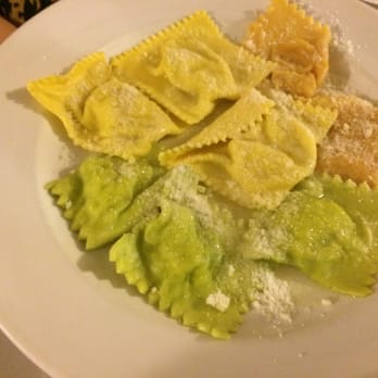 Trattoria del Tribunale - Degustazione de Tortelli: 3 spinach, 3 artichoke, and 2 sweet squash tortelli adorned with Parmesan and olive oil. - Italian Near Me - Parma, Puerto Rico