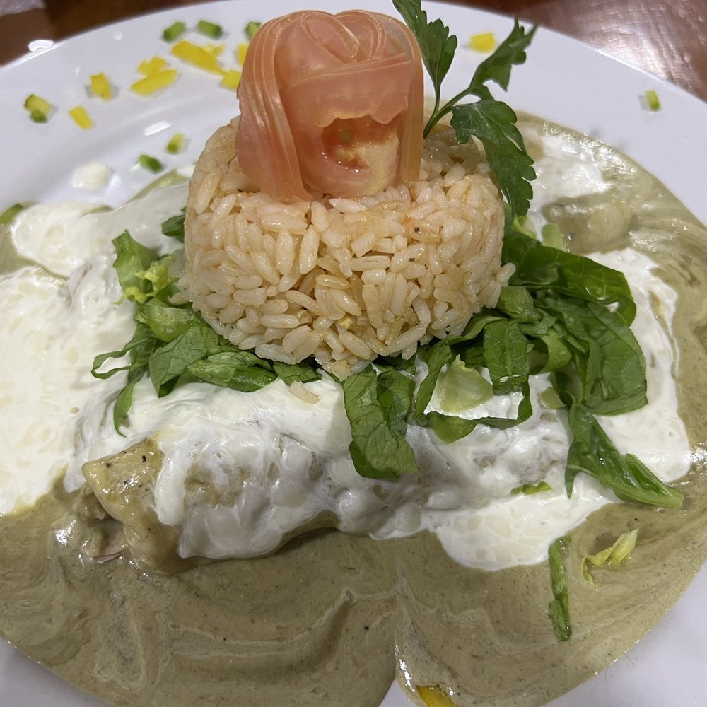 Chicken enchiladas with Suzette sauce Chicken enchiladas with Suzette sauce