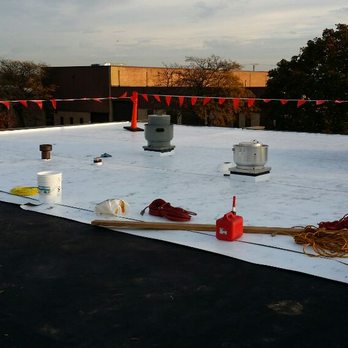 Croixco Construction - Installing Johns Manville 60 mil TPO flat roof in Schaumburg Illinois - Windows Installation Near Me - Schaumburg, Illinois Croixco Construction - Installing Johns Manville 60 mil TPO flat roof in Schaumburg Illinois - Windows Installation Near Me - Schaumburg, Illinois