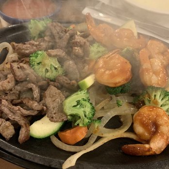 Mi Tenampa - a plate of food being cooked - Mexican Near Me - Indianapolis, Indiana Mi Tenampa - a plate of food being cooked - Mexican Near Me - Indianapolis, Indiana