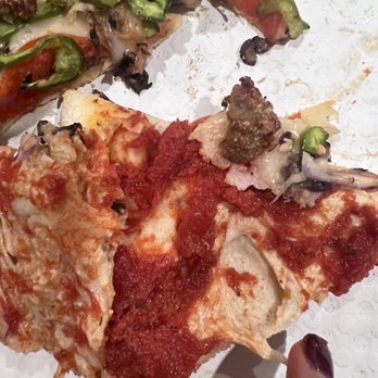 Cenario's pizza - I peeled back the cheese to show you that it's not melted cheese... it's raw dough - Pizza Near Me - Fairfield, California Cenario's pizza - I peeled back the cheese to show you that it's not melted cheese... it's raw dough - Pizza Near Me - Fairfield, California