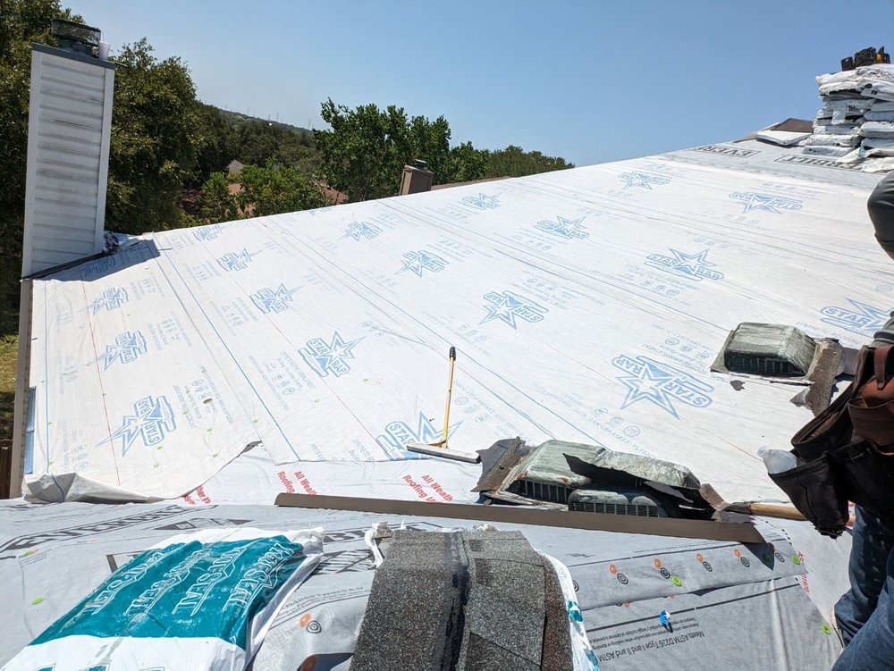 Slide of Big Boy Roofing