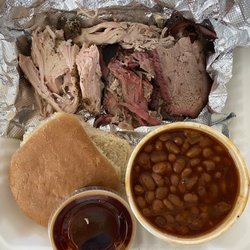 Pork on a Fork BBQ Food Truck - Sampler: chicken, pulled pork, brisket. $17. Side of baked beans $3. Bun. Sauce. 0$