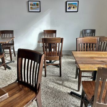 Native Coffee - Partial interior view with local art and plenty of natural light - Coffee & Tea Near Me - Houston, Texas Native Coffee - Partial interior view with local art and plenty of natural light - Coffee & Tea Near Me - Houston, Texas