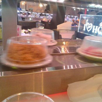 I Luv Hot Pot - This conveyor belt goes all around the restaurant and you just pick up your food - Hot Pot Near Me - Duluth, Georgia