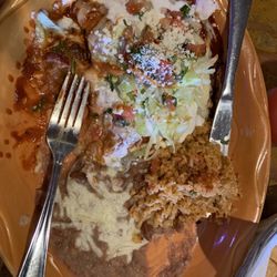 Steak enchiladas with red sauce