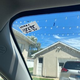 Handmade mileage next service sticker and stroke of sharpie on my windshield Handmade mileage next service sticker and stroke of sharpie on my windshield
