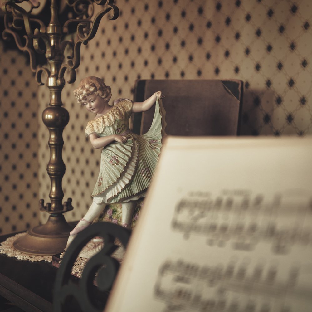 First Mayor's House - Doll on piano. - Educational Services Near Me - Salinas, California