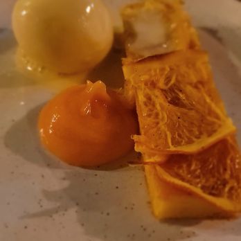 Ubiquitous Chip - Orange cake with citrus curd and orange ice cream - Bars Near Me - Glasgow, GLG Ubiquitous Chip - Orange cake with citrus curd and orange ice cream - Bars Near Me - Glasgow, GLG