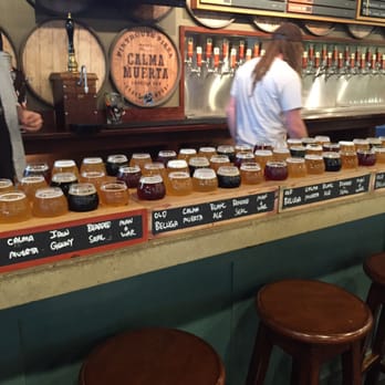 Austin Eats Food Tours - Flights (too many) of beer at Pinthouse Pizza - Food Tours Near Me