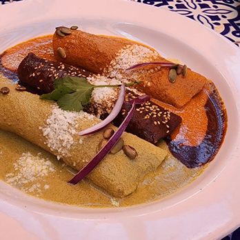 La Casita Mexicana - Tres moles enchiladad 8.5/10. I NEED MORE FOOD ON THIS PLATE for a 10/10 rating - Mexican Near Me - Bell, California