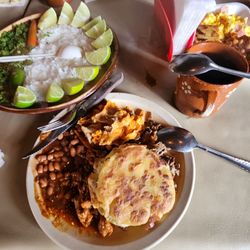 Taqueria Santo Niño de Atocha - Chilaquiles, whole beans and red pork.