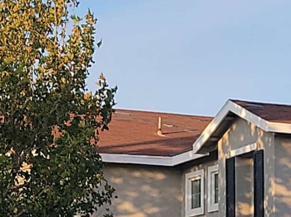 Slide of Oak Hills Roofing