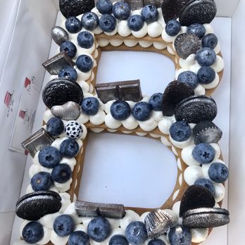 Macarons by Mila Pastry - 'B' cake - Silver Palette design (giant blueberries, chocolate bars and Oreos dusted with silver glitter) - Custom Cakes Near Me
