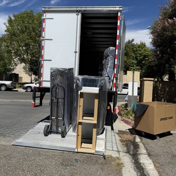 Next Moving Company - Gregory and Matt downloading and reinstalling my belongings at the new house - Movers Near Me - Pasadena, California