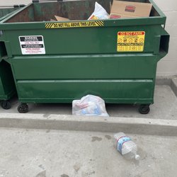 Vernola Marketplace - This person could not lift his/her arm to dump their trash in the bin! Idiots are everywhere!!!!!