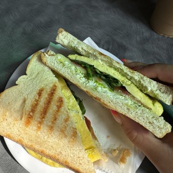 Crave Coffee House - Brunch on the hill (pesto, spinach, egg, provolone, bacon, on sourdough) - Coffee & Tea Near Me - Saint Louis, Missouri Crave Coffee House - Brunch on the hill (pesto, spinach, egg, provolone, bacon, on sourdough) - Coffee & Tea Near Me - Saint Louis, Missouri