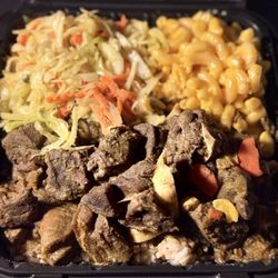 Cutter's Jamaican Restaurant - Curry Goat with rice/beans, cabbage and Mac and cheese.