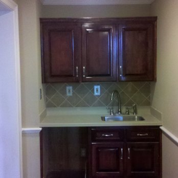 Rodger Construction - a kitchen with a sink and cabinets - General Contractors Near Me Rodger Construction - a kitchen with a sink and cabinets - General Contractors Near Me